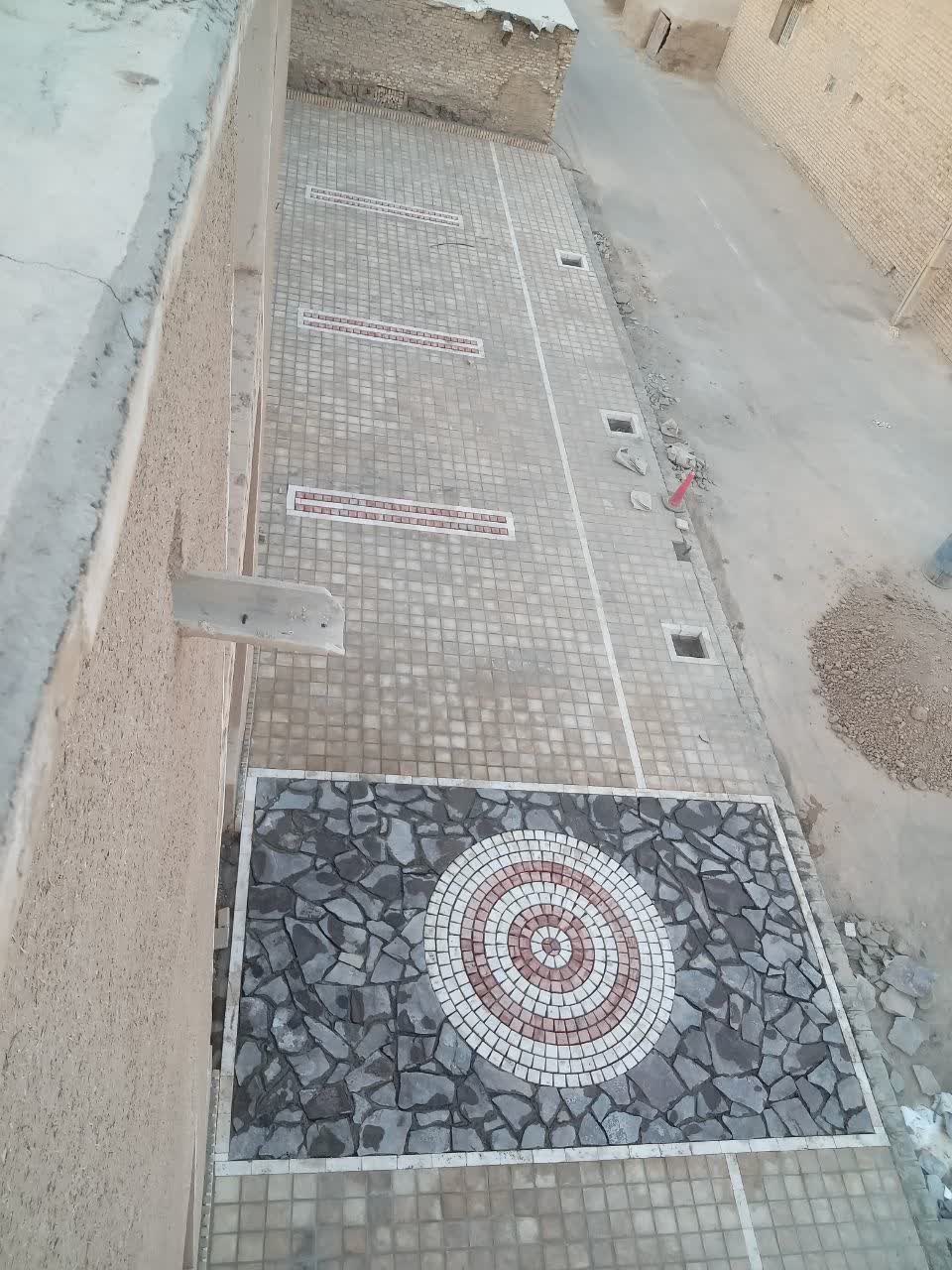 اجرای عملیات سنگ‌فرش، پیاده‌روسازی و جداره‌سازی روستای بلان